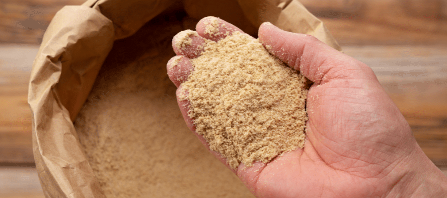 dry bulk material being prepared for heating to prevent powder agglomeration.